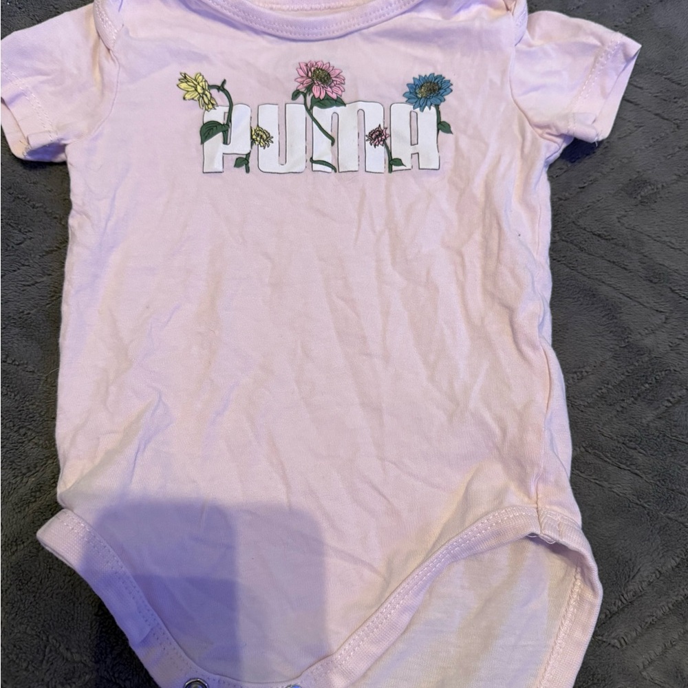 Puma Pink Baby Onesie with Floral Accents